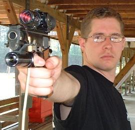 Capt Curtis with a Rika trainer affixed to his M1911